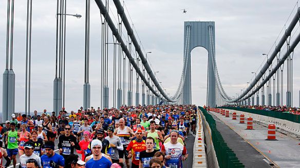 Runners cross the Verrazano-Narrows Bridge at the start of the New York City Marathon, Sunday, Nov. 1, 2015, in New York. (AP Photo/Jason DeCrow)